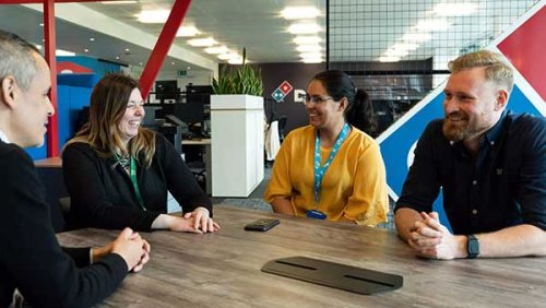 Group of employees at Domino's Pizza Headquarters