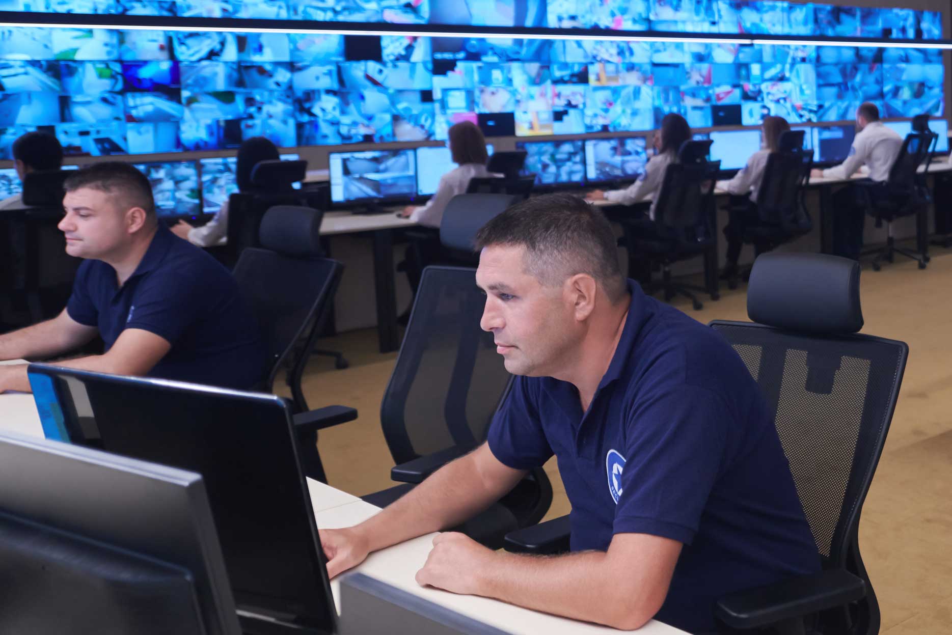 Men working in a data center