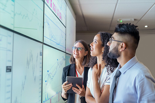 Man and women looking at a graph