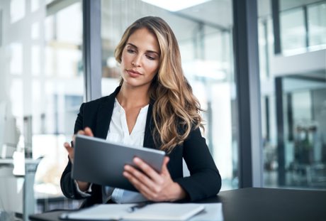 woman checking her ipad