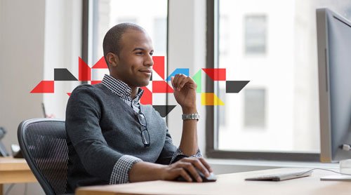 a man looking at a computer