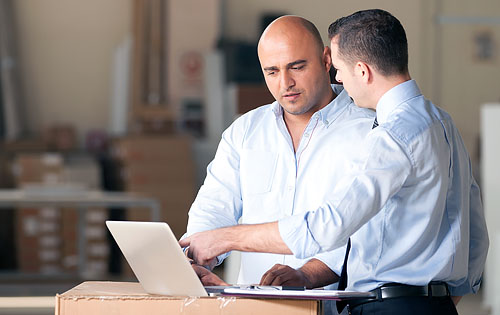 people working on the computer