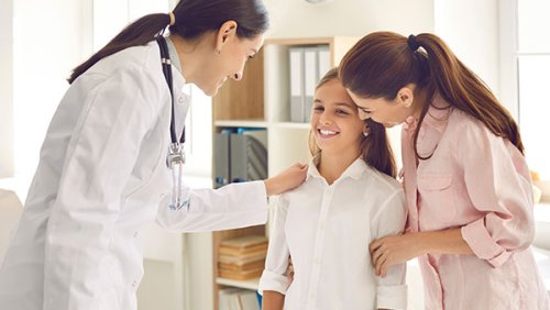 Doctor checking a girl's health
